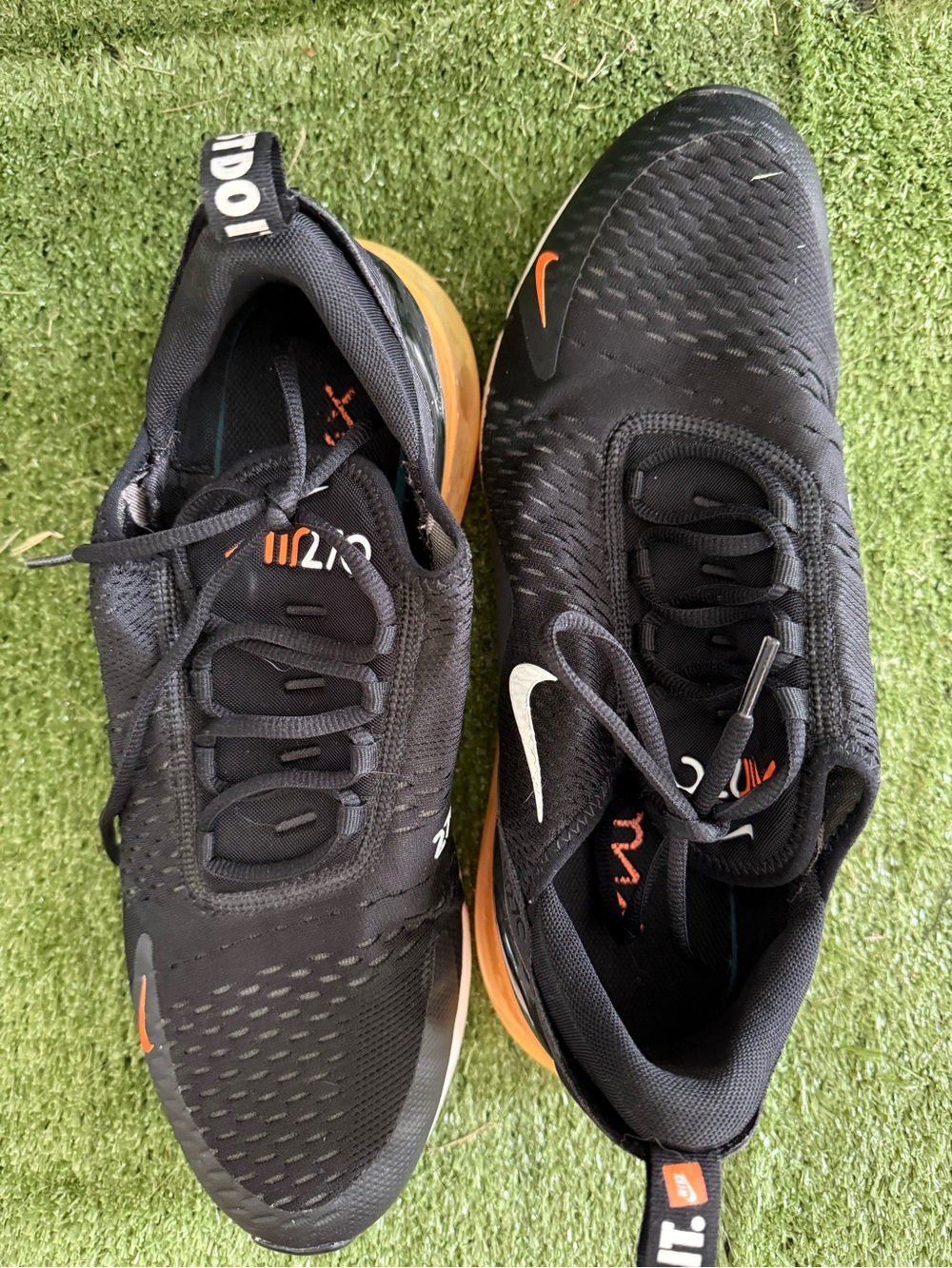 Nike Men’s Black Sneakers with Orange Accents